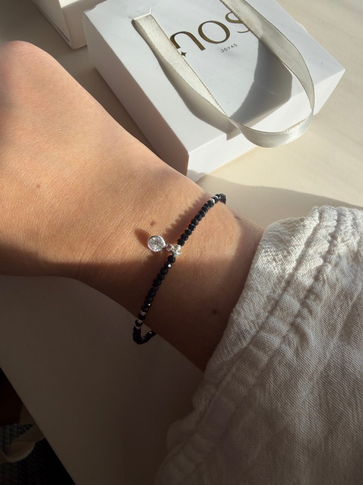 Pulsera piedra Onix con punto de luz