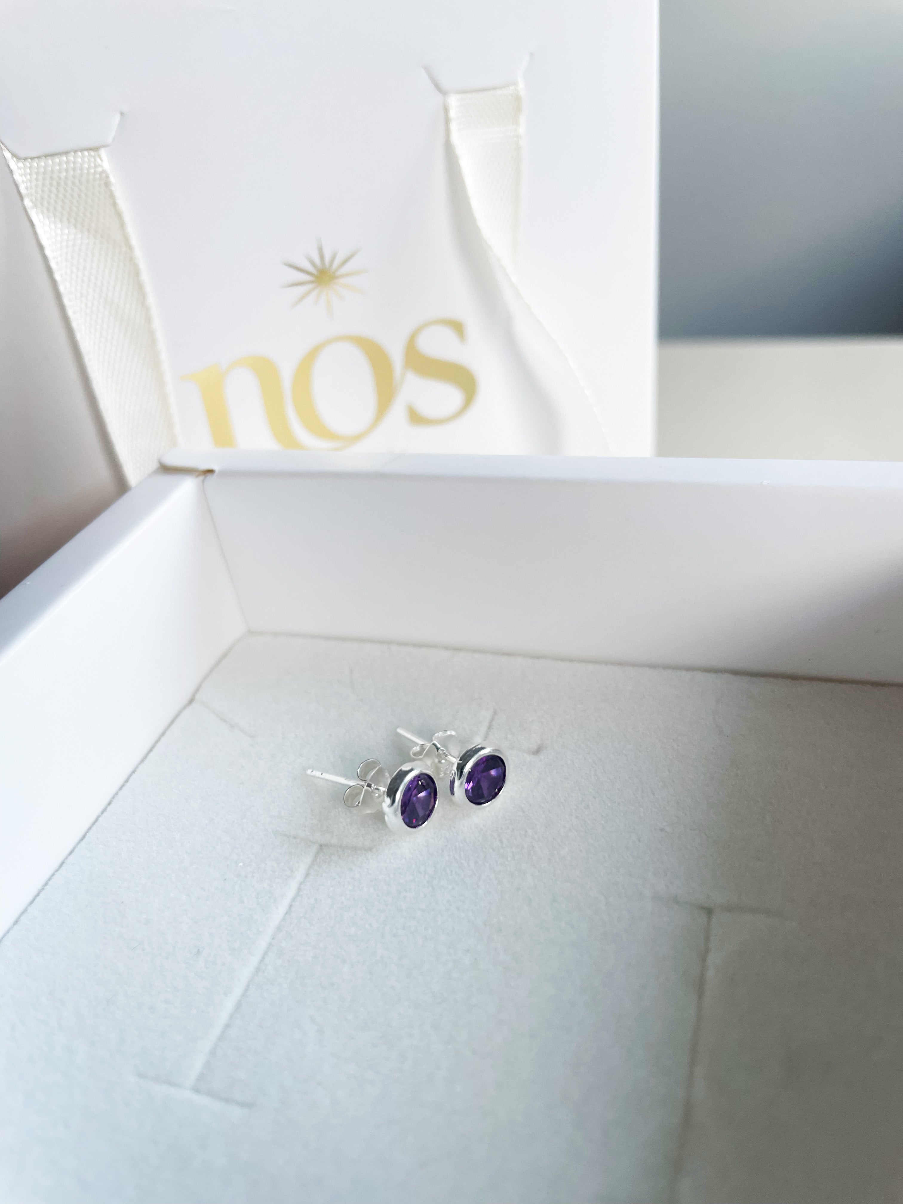 Caravanas PUNTO DE LUZ VIOLETA